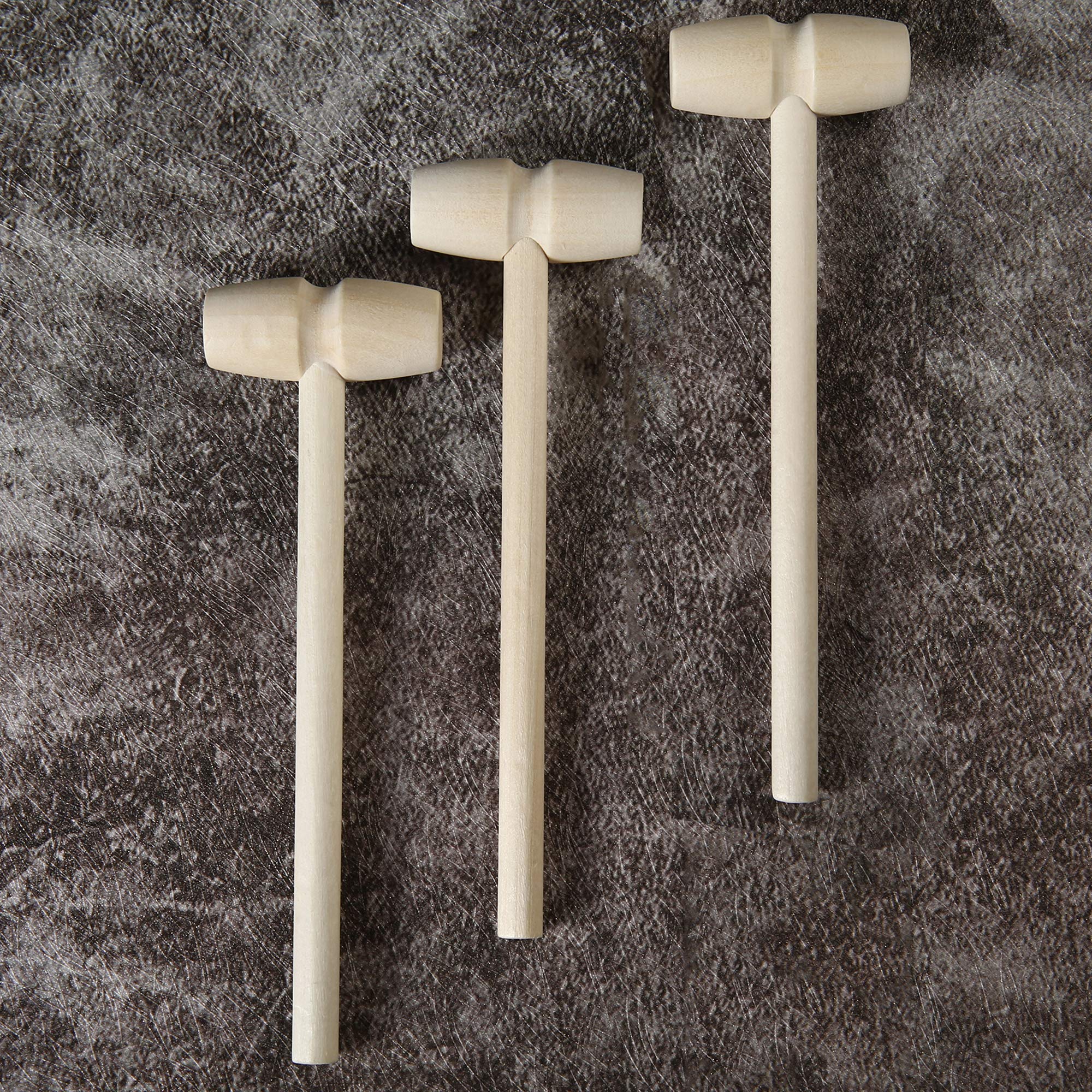 TDOCK wooden hammers shown with breakable chocolate gifts