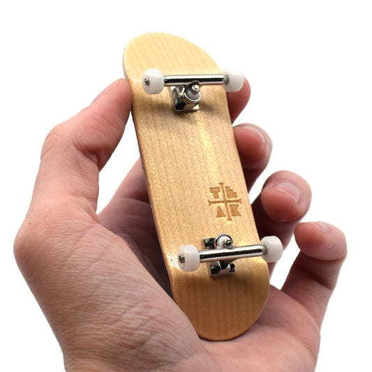 Teak Tuning 32mm Pro fingerboard deck ready for smooth grinds and precise control.
