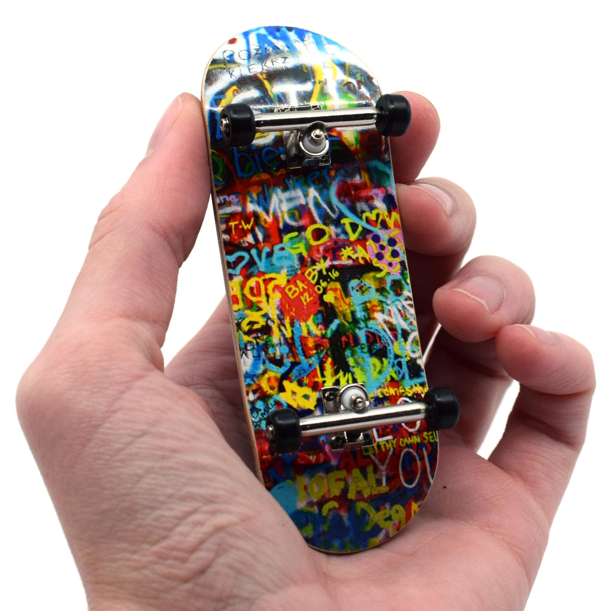 Teak Tuning Graffiti Wall deck with bold art for street-style skating.