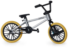 Tech Deck finger bike showing moveable parts and adjustable handlebars for tricks.