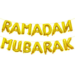 Tedercle Ramadan Mubarak banner letters illuminate walls with festive gold shine