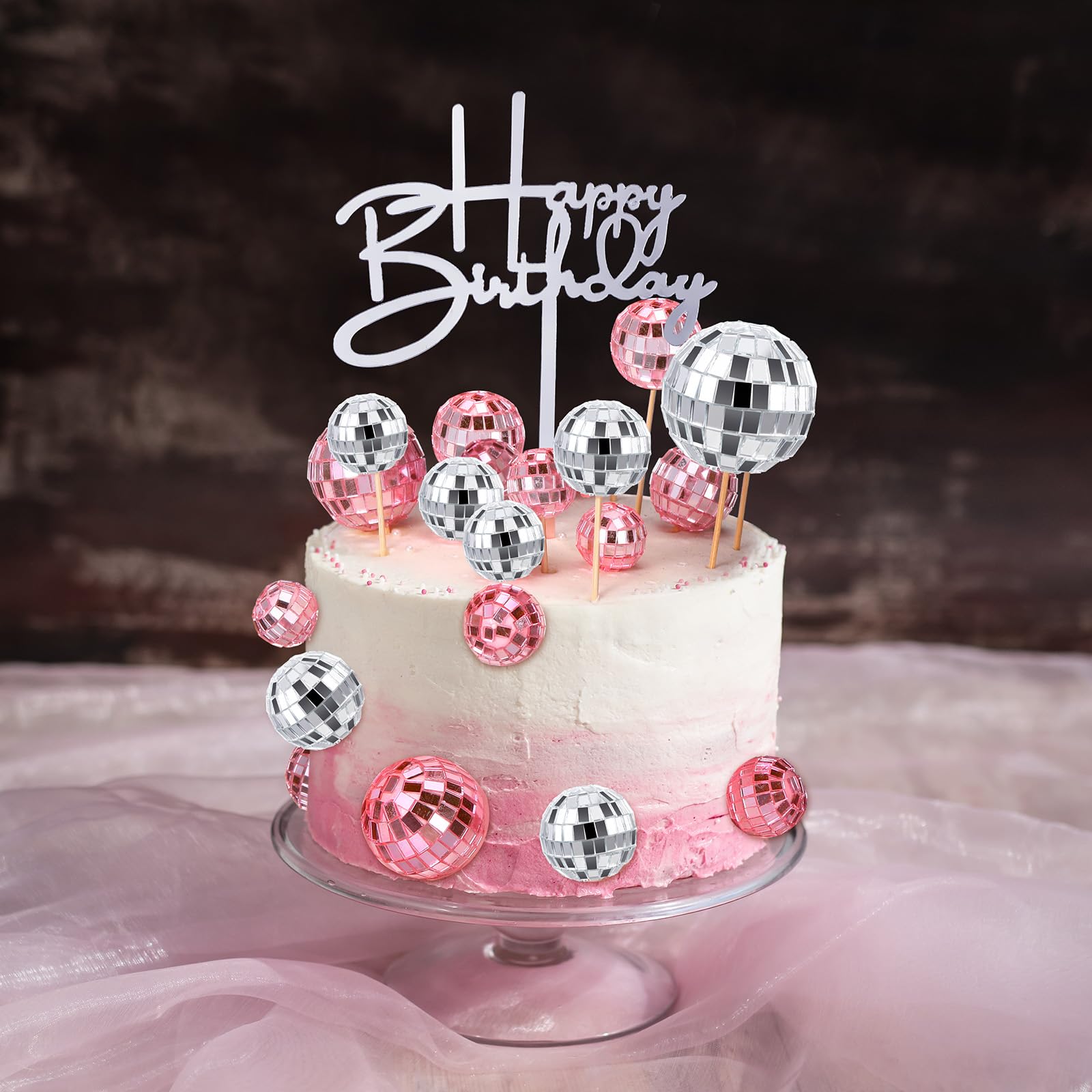 Teenyyou disco ball toppers sparkle on cupcakes for festive celebrations.