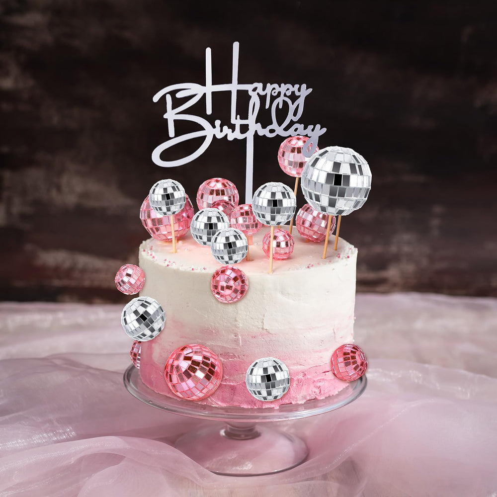 Teenyyou disco ball toppers sparkle on cupcakes for festive celebrations.