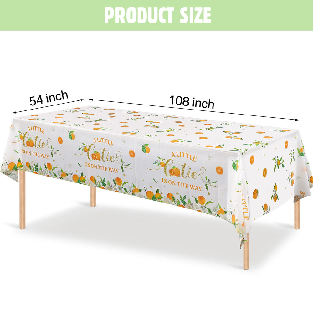 Tegeme Little Cutie tablecloth showing the on the way text in citrus theme
