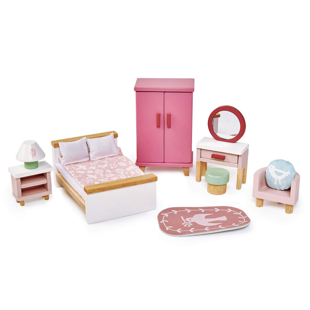 Tender Leaf Toys dovetail bedroom set bed in dollhouse, warmly appointed for imaginative play