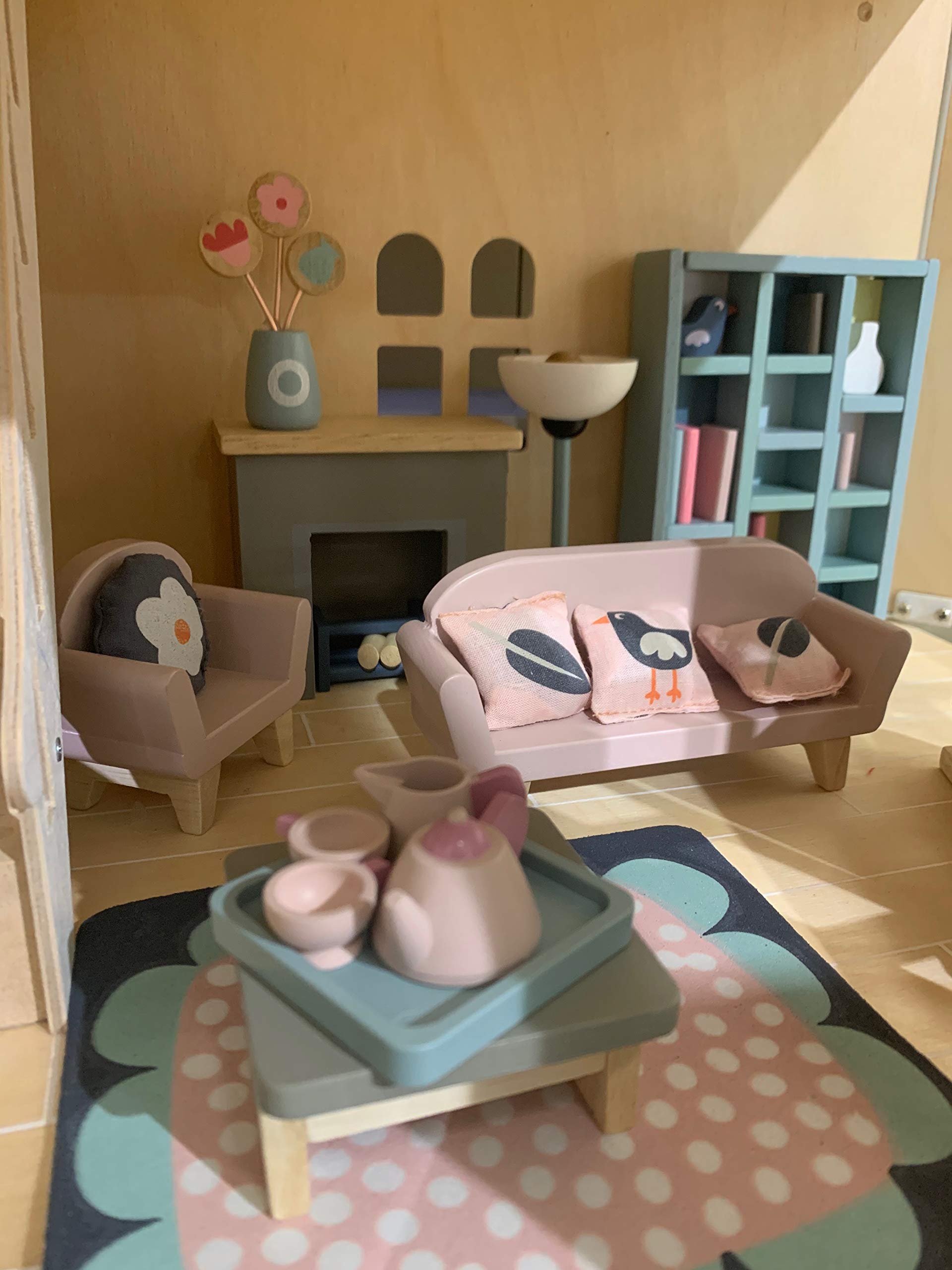 Tender Leaf Toys dovetail fireplace with logs adds warm ambience for storytelling moments.