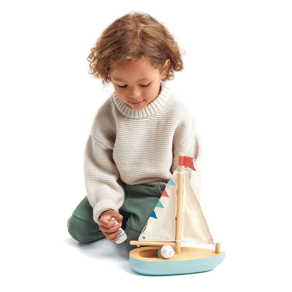 Tender Leaf Sailaway Boat wood texture and color enhance tactile play experiences