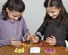Assorted TENZI dice colors highlight variety for quick scoring challenges.