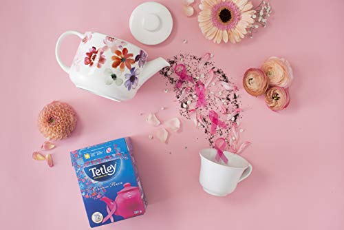 Porcelain mug with Tetley Orange Pekoe Tea inviting warmth.