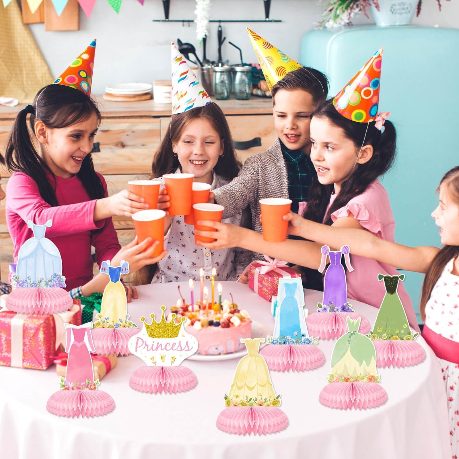 Tewess princess birthday setup with honeycomb centerpieces brightening tables