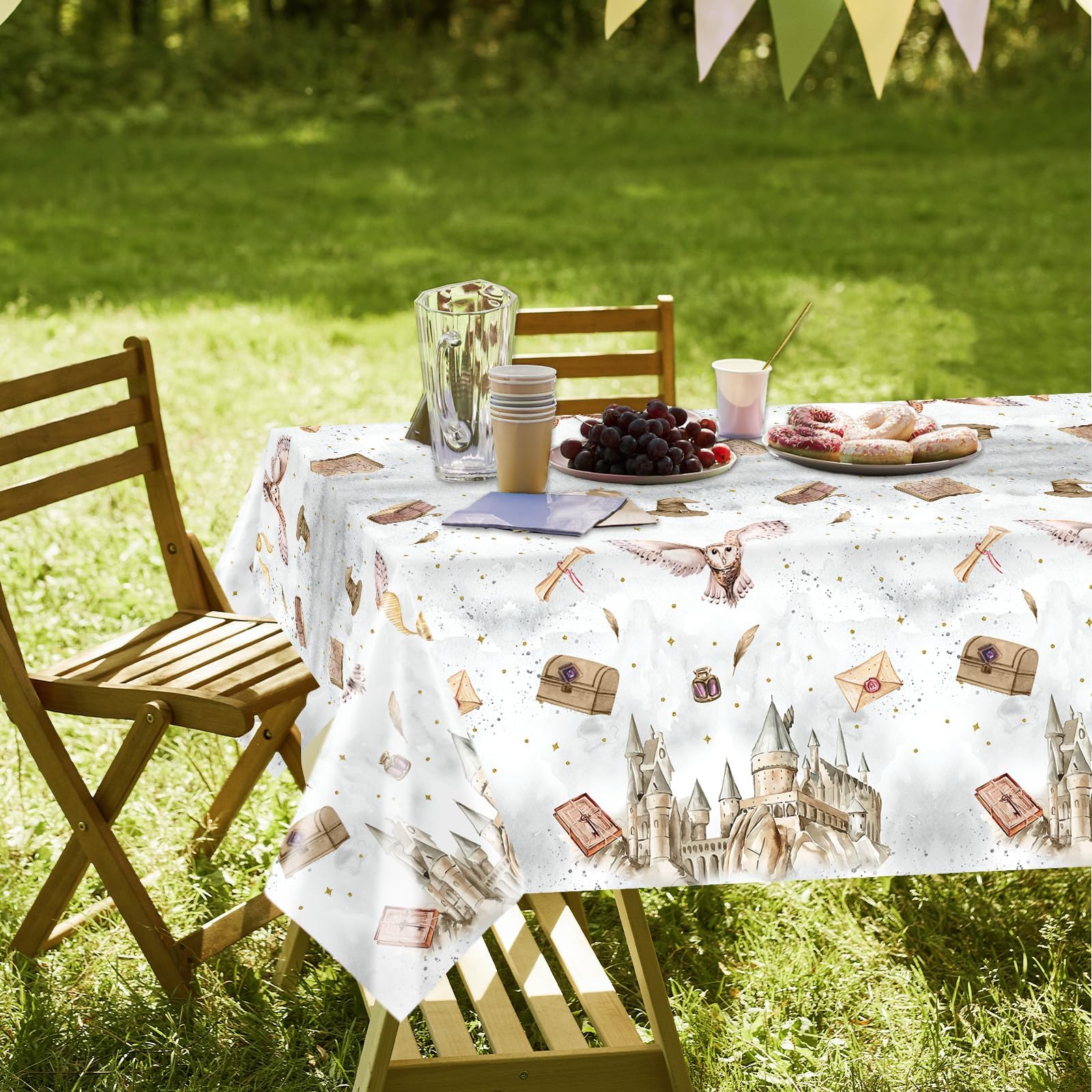 Tewess wizard tablecloth pairs with hats and wands to enhance magic-themed parties.