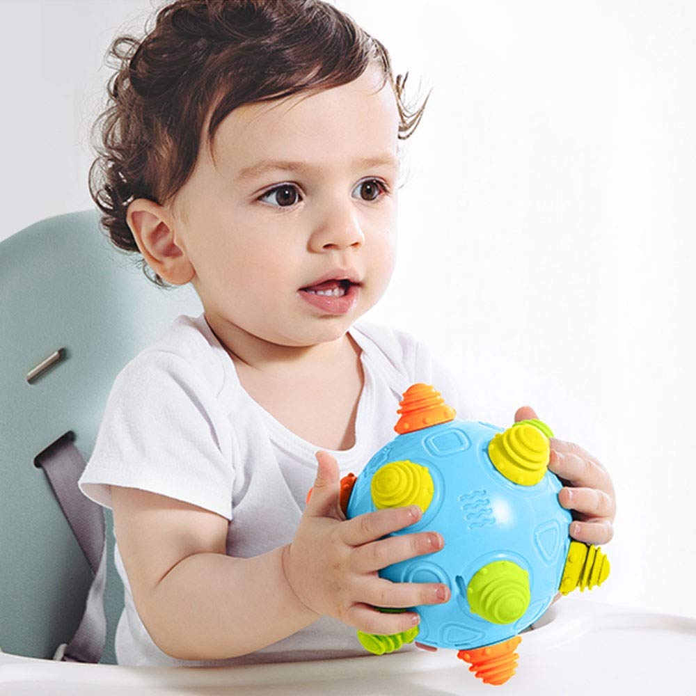 Teytoy kid-friendly playtime with bouncing music ball on carpet.