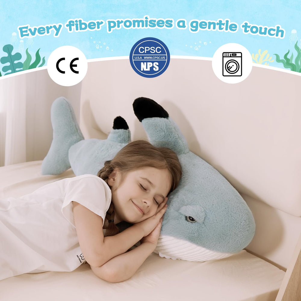 Tezituor 32inch shark plush as a cozy sleep pillow on a bed