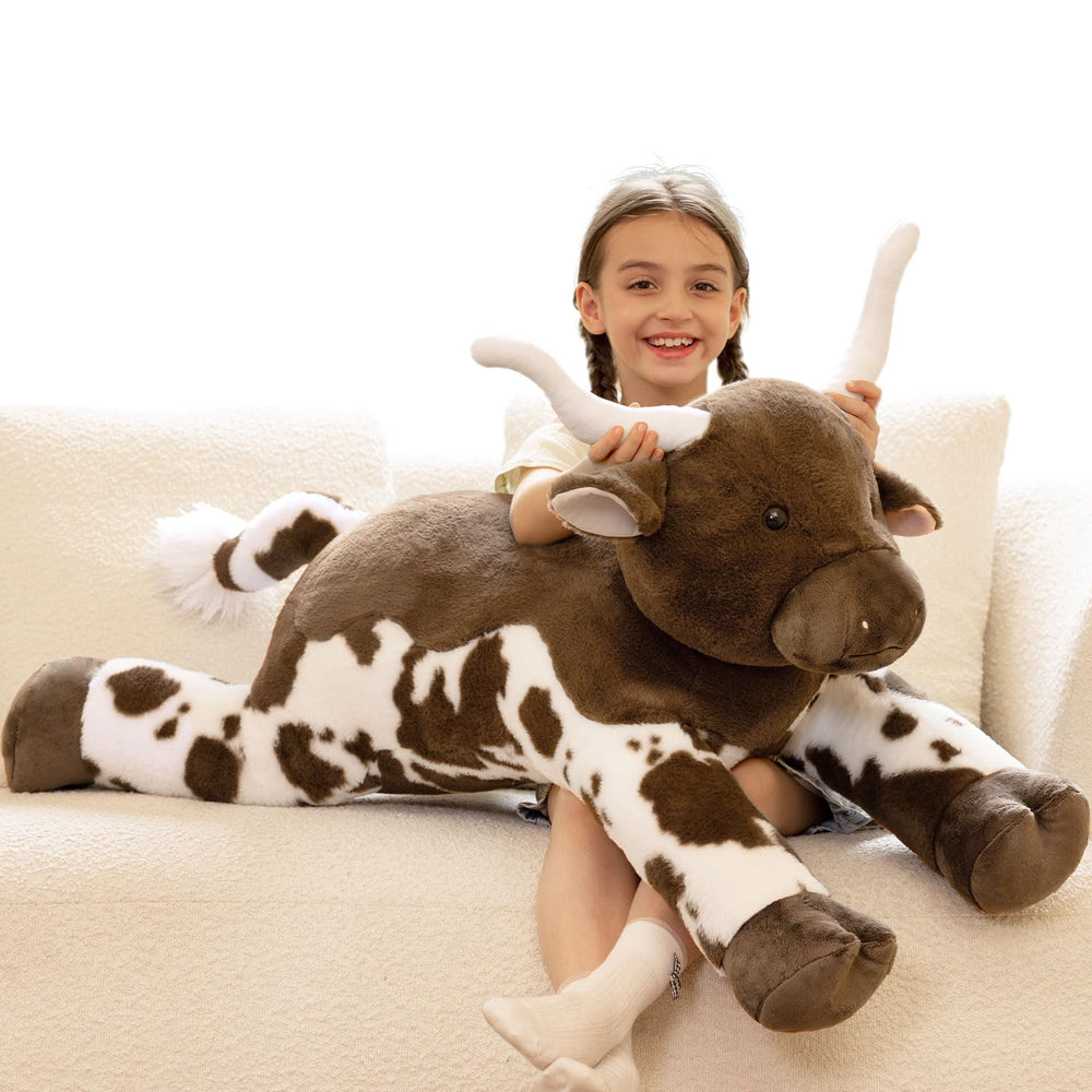 Tezituor 43.3-inch giant longhorn cow plush for cozy hugs and support.
