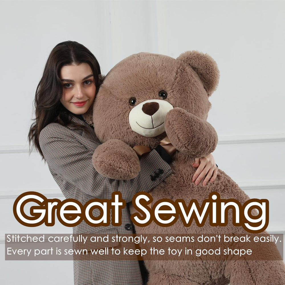 Tezituor teddy bear with ribbon bow adds gift-ready charm.