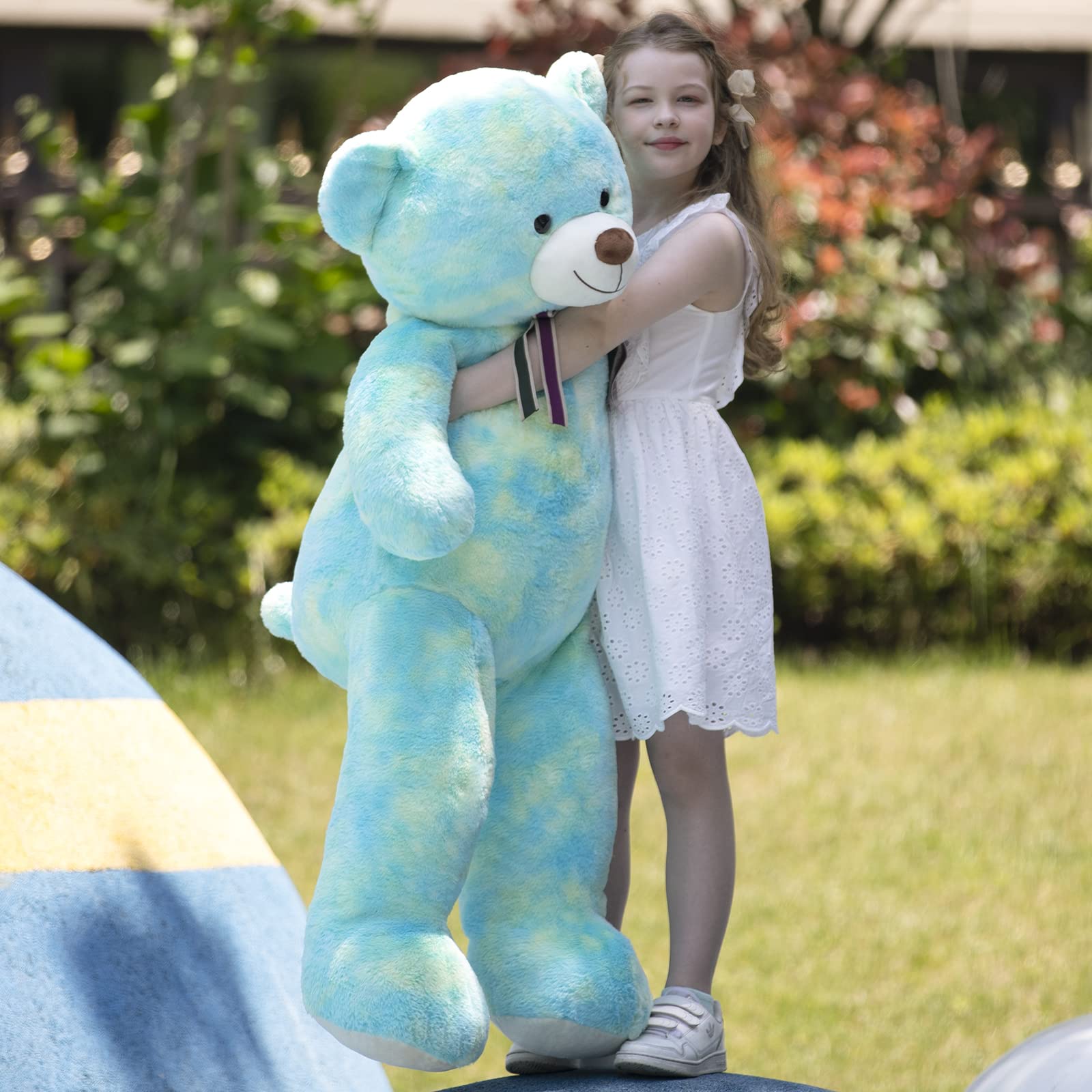 Tezituor giant teddy bear with satin ribbon adds charming bedside decoration