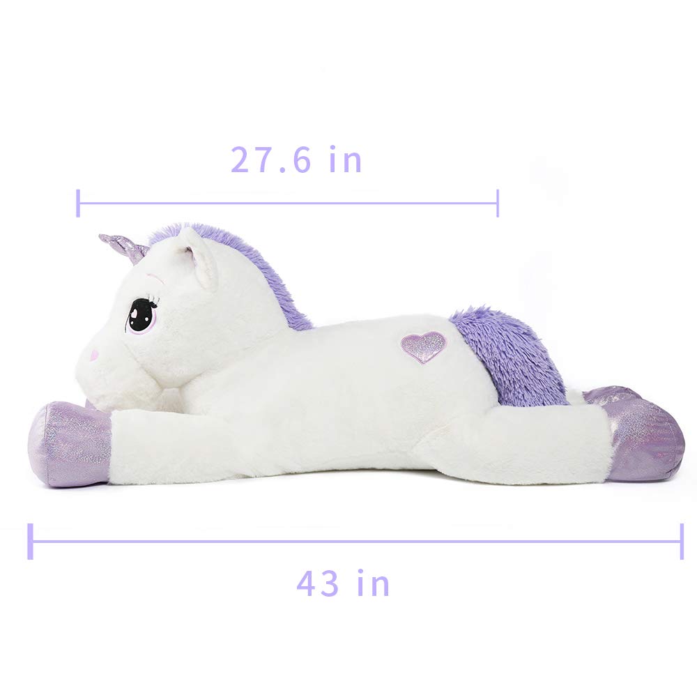 Tezituor unicorn plush close-up of friendly face and fluffy mane