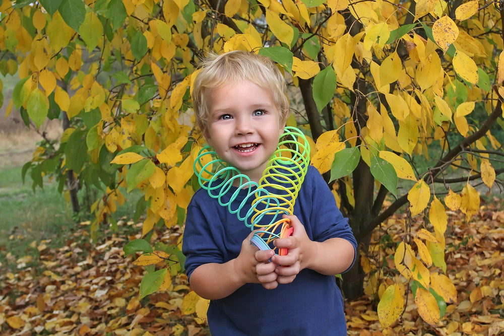 The Dreidel Company 3-inch coil spring is a bright classroom rewards toy.