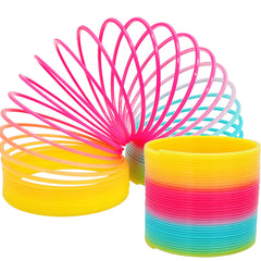 The Dreidel Company multicolor coil spring shown with carnival prizes and party booths.