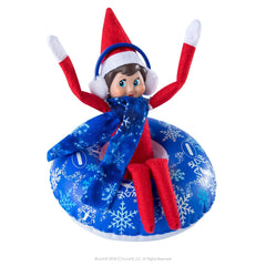 The Elf on the Shelf Claus Couture snow tube set adds playful festive storytelling to your holiday scene.