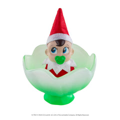 The Elf on the Shelf Frost Pips baby elf with blue eyes sparks holiday imagination.