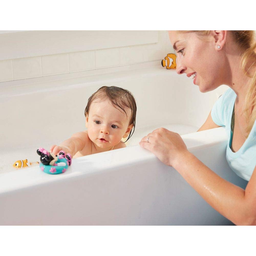 Minnie Mouse squirties beach ball motif sparks splashy bath or tub play.