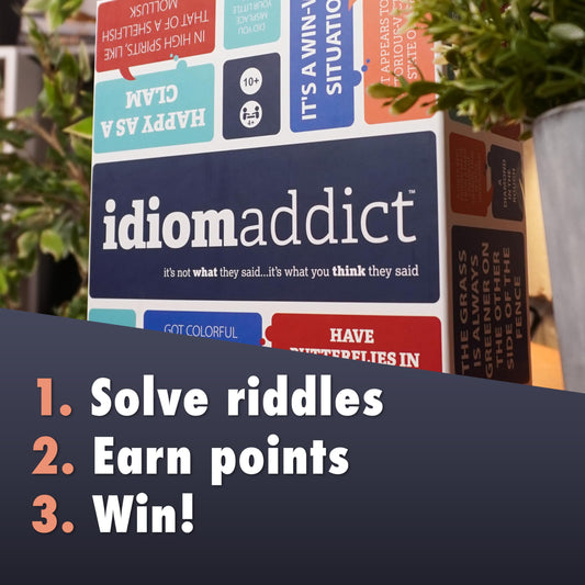 Idiom Addict box and contents shown set up for quick play and group interaction.