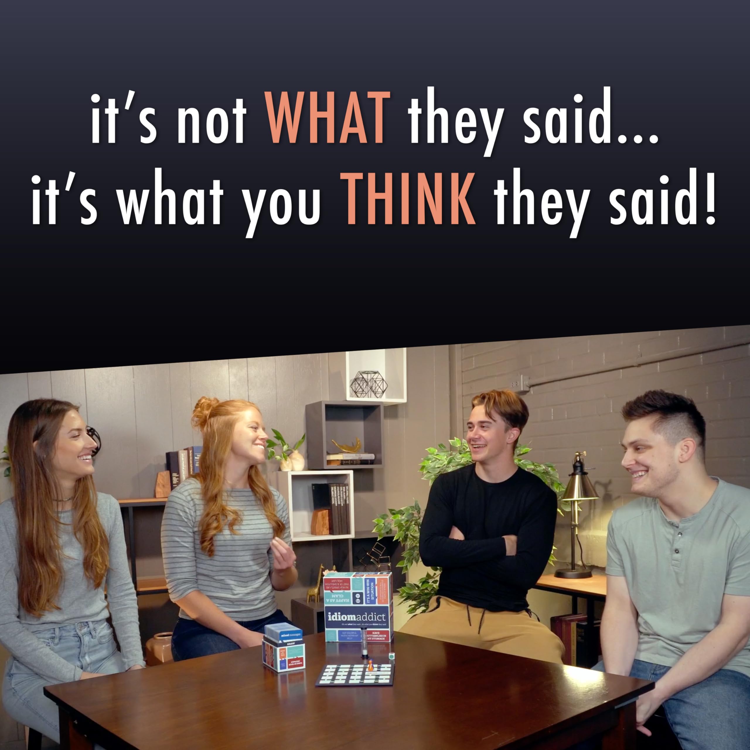 Friends laughing while deciphering idioms and gibberish phrases during Idiom Addict.