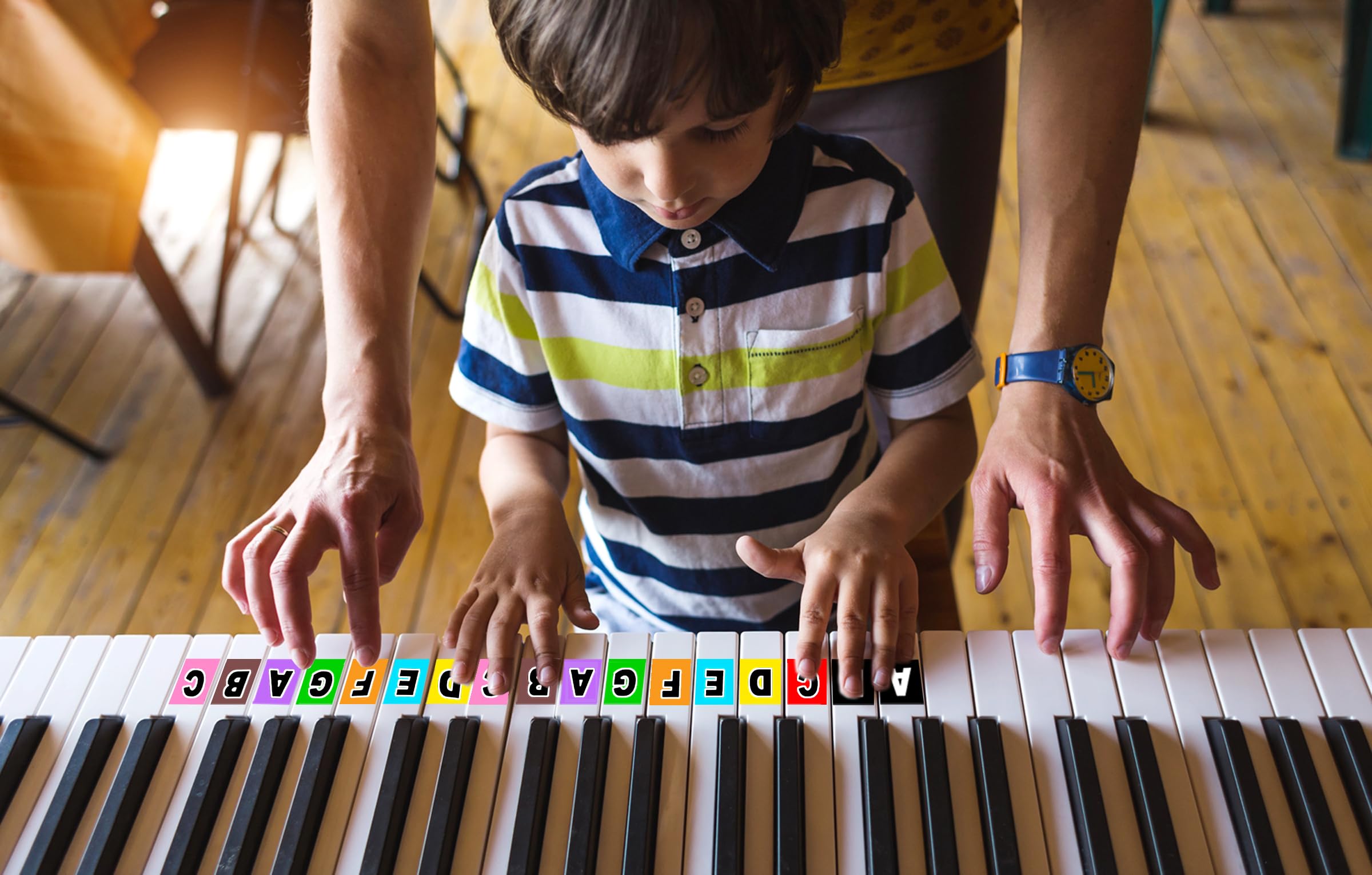 The Happy Piano Kit large laminated teaching tool for group play.