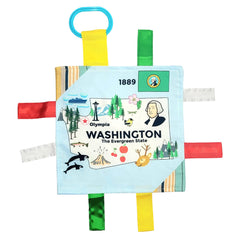 The Learning Lovey Baby Jack Co 8x8 Washington State tag stroller-toy close-up with crinkle texture for sensory exploration.