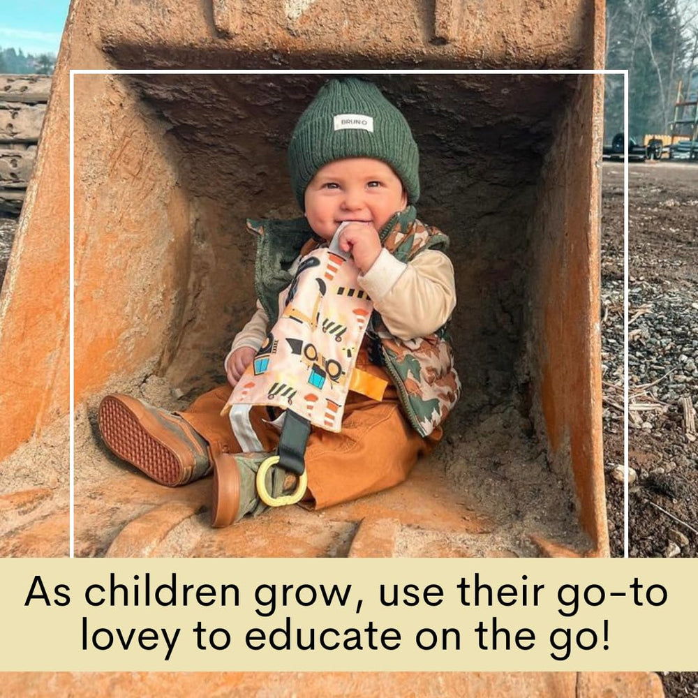 The Learning Lovey Baby Jack stroller clip toy is easy to attach for travel