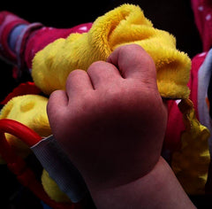 The Learning Lovey firefighter soft plush backing delivers comforting texture.