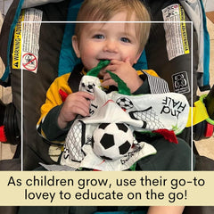 Stroller clip attached to the toy for on-the-go use