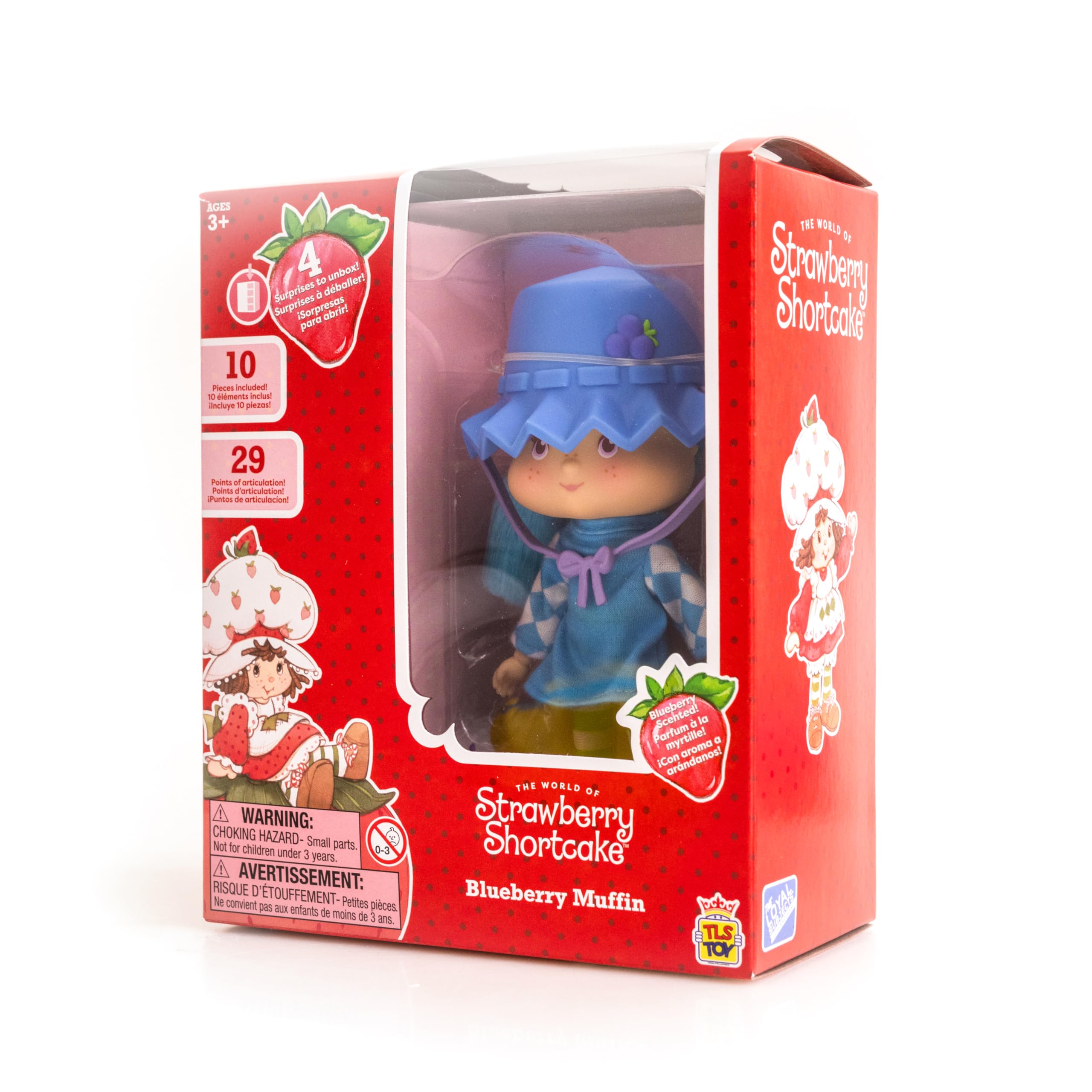 The Loyal Subjects Blueberry Muffin Fashion Doll arrives in a red polka dot gift box.