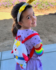 Rainbow arm warmers provide color accents during play