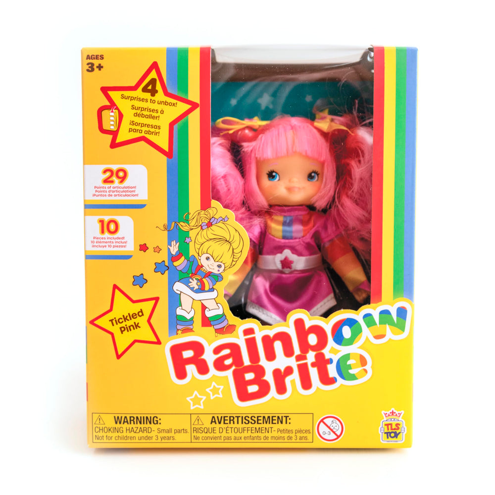 The Loyal Subjects Rainbow Brite Tickled Pink packaging displays yellow gift box.