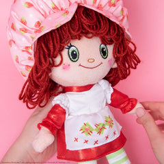 The Loyal Subjects Shortcake gold shoes with heart accents for charm.