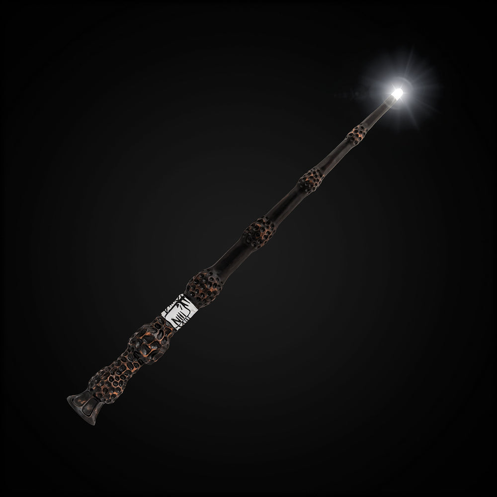 The Noble Collection Elder Wand on a display shelf with glossy finish.