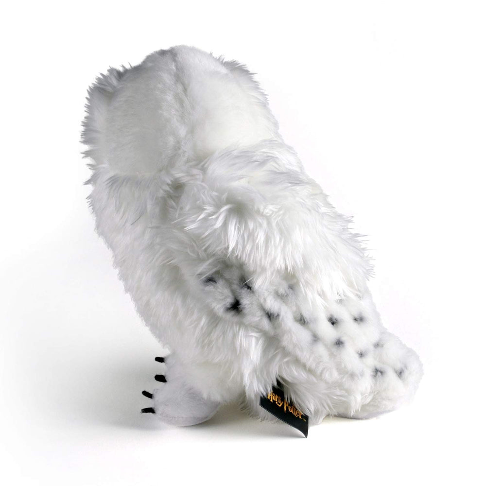 The Noble Collection Hedwig Plush official label confirms authenticity.
