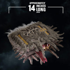 The Noble Collection Monster Book of Monsters plush fabric texture close-up, soft to touch.