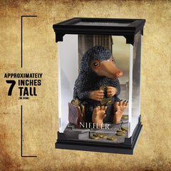 The Noble Collection Niffler No.1 removable cover demonstrates interactive display option.