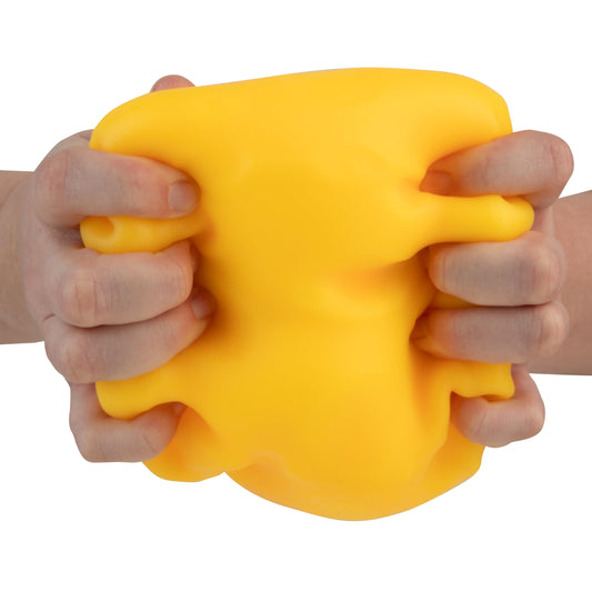 Close-up texture on Easy Sqweezy Super Cheesy showing soft squishy material.