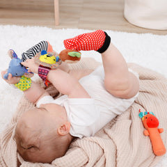 The Peanutshell ankle rattle offers soft, gentle engagement for crawling and exploration.