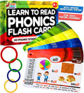 The Scholar Ant phonics flash cards in hand encourage structured reading practice.