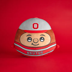 Brutus 12-inch plush on desk, ideal study buddy.