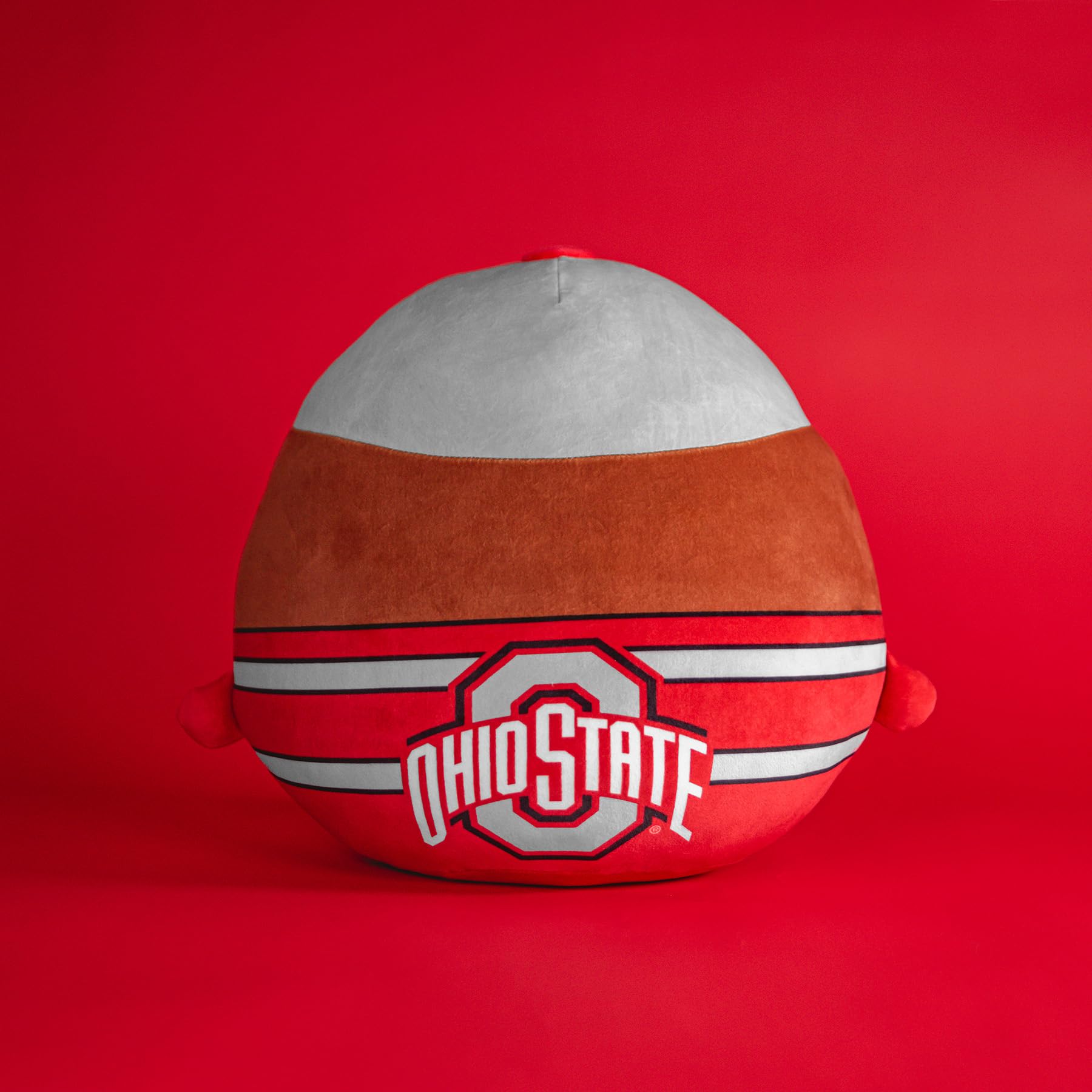 The Sleep Squad Brutus 12-inch plush side view, compact desk buddy.