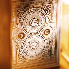 theory11 Artisan Playing Cards White Edition close up shows gold foil on black stock