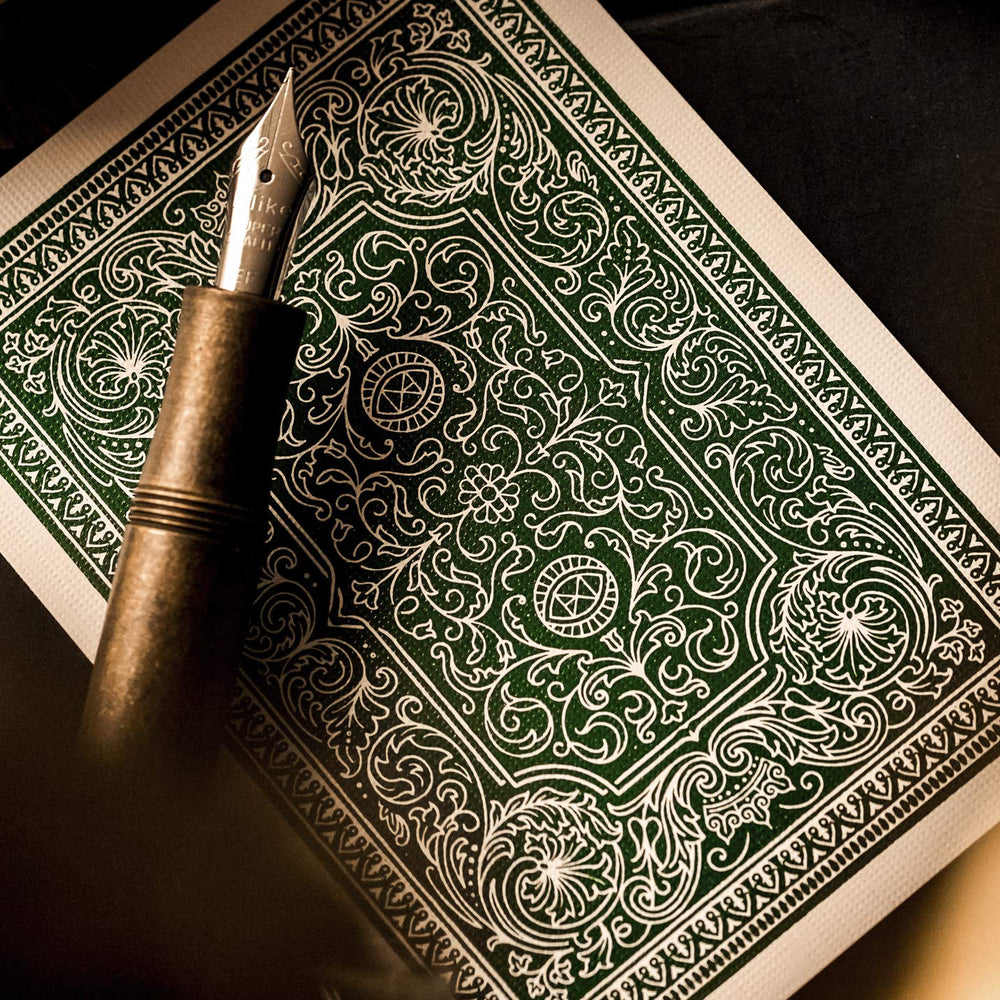 theory11 Derren Brown playing cards face designs reveal intricate art and illusion cues.