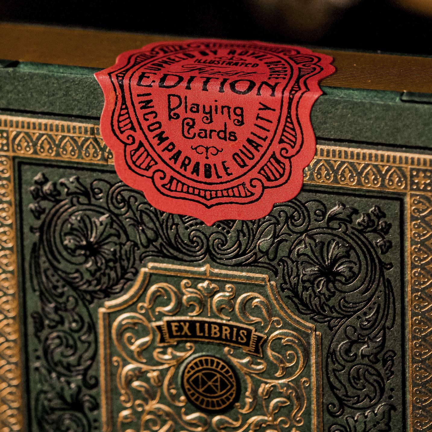 theory11 Derren Brown playing cards gold and green wrap evokes antique book allure.