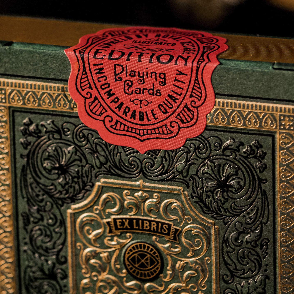 theory11 Derren Brown playing cards gold and green wrap evokes antique book allure.